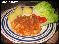 Pork chop with tomato and rosemary