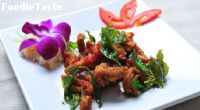 Fried chicken with hot basil leaves ไก่ผัดใบกระเพรา