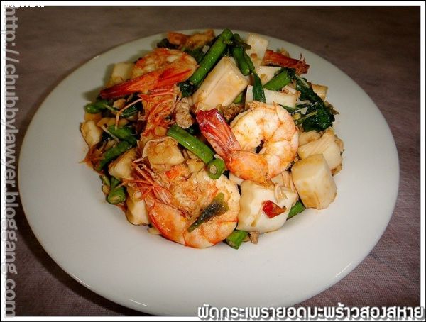 ผัดกระเพรายอดมะพร้าวกุ้งกับหมูสับ (Spicy stir fried coconut shoot with minced pork and shrimps)